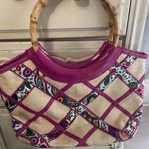 Straw/wicker, pink and paisley handbag.